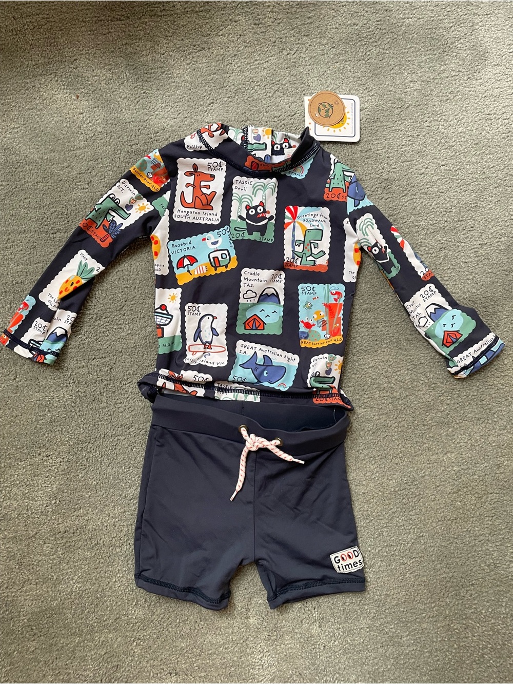 Boys matching swim trunks and rash guard top NWT